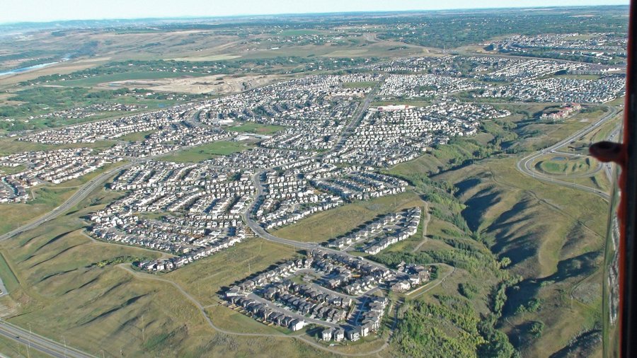 Aerial drone view of Tuscany ravine and community